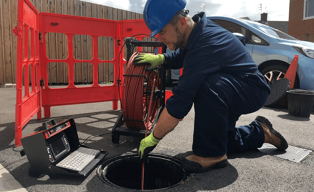 Lanc Rod Employee Inspecting drain with camera system